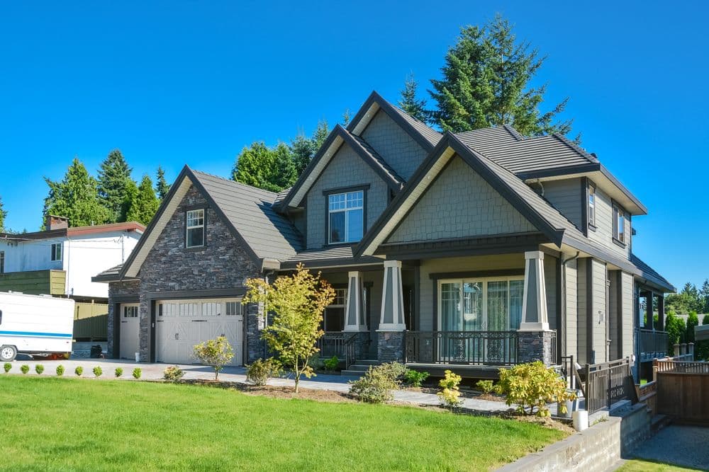 Two-storey home with a stone and siding front